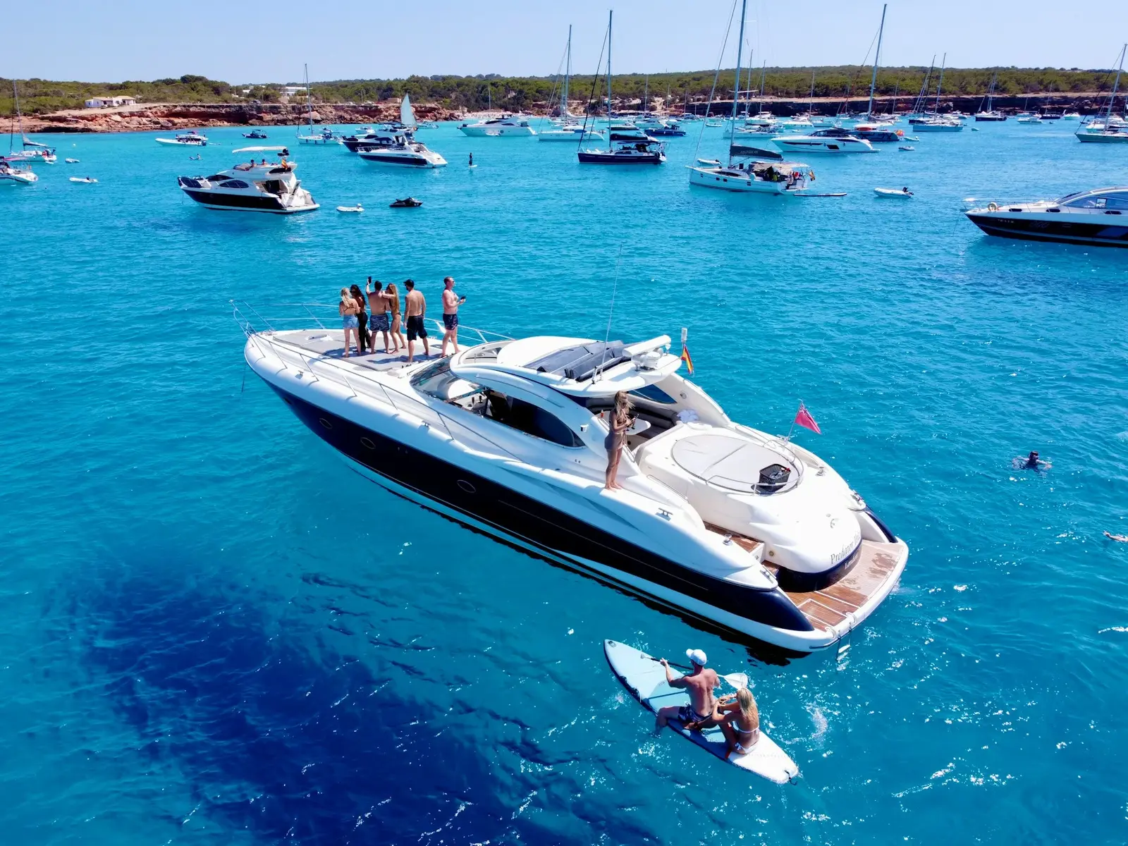 Private charter catamaran anchored in shallow turquoise water off Playa Bavaro in Punta Cana